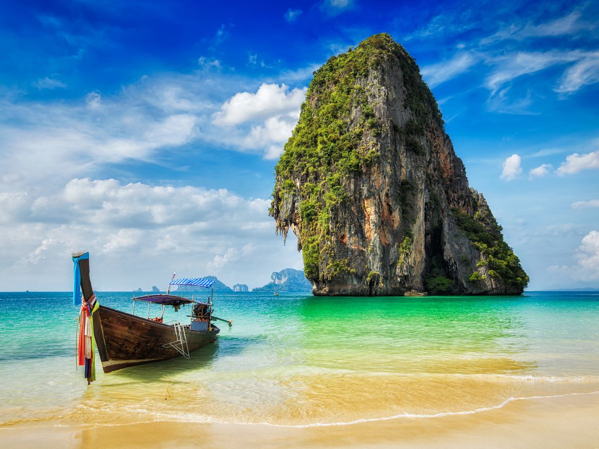 Long-tail boat on a beach in Thailand